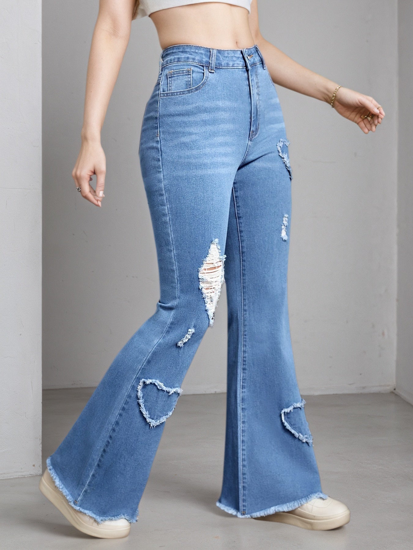 Trendy 2025 Women's Light Blue Flare Jeans – High-Stretch, Distressed Denim with Heart Patch
